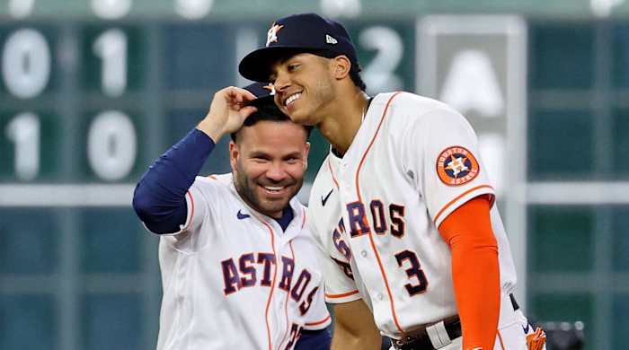 Astros infielders Jose Altuve, left, and Jeremy Peña celebrate Houston’s win in Game 1 of the 2022 ALCS.